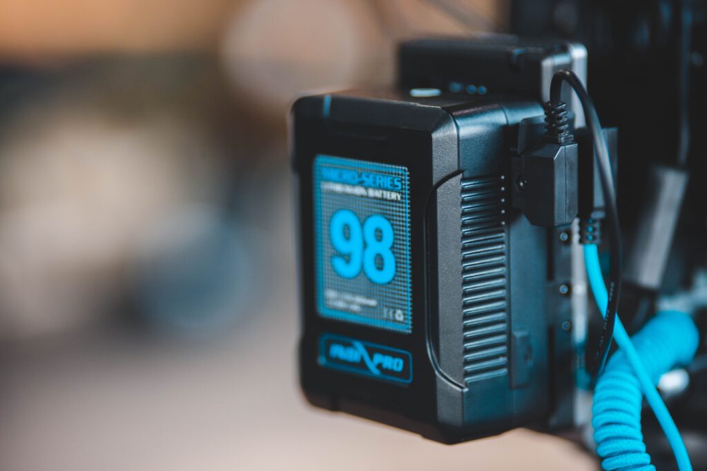 pexels photo 11457403 11457403 Close-up of a high-capacity portable battery with digital display showing 98 percent charge.